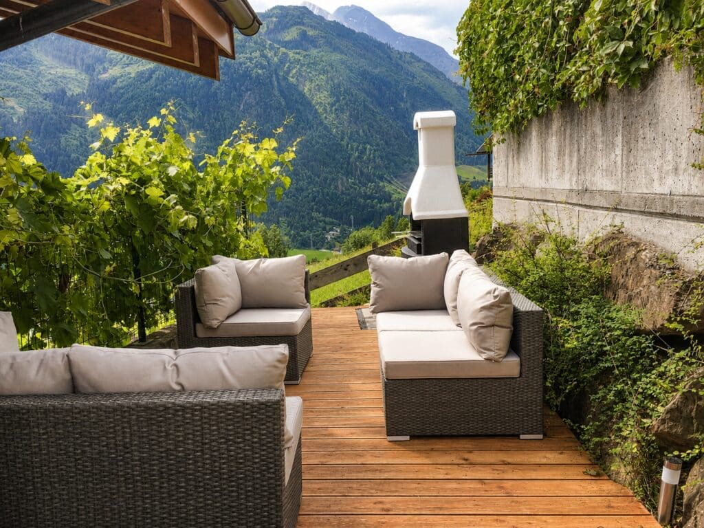Penthouse private outdoor seating in a sheltered alpine setting