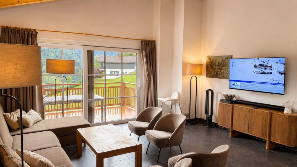 Cozy modern living room with scenic view Chalet an der Piste Penthouse