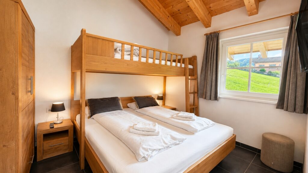 Cozy alpine double bed bedroom with full sized highsleeper bed Penthouse